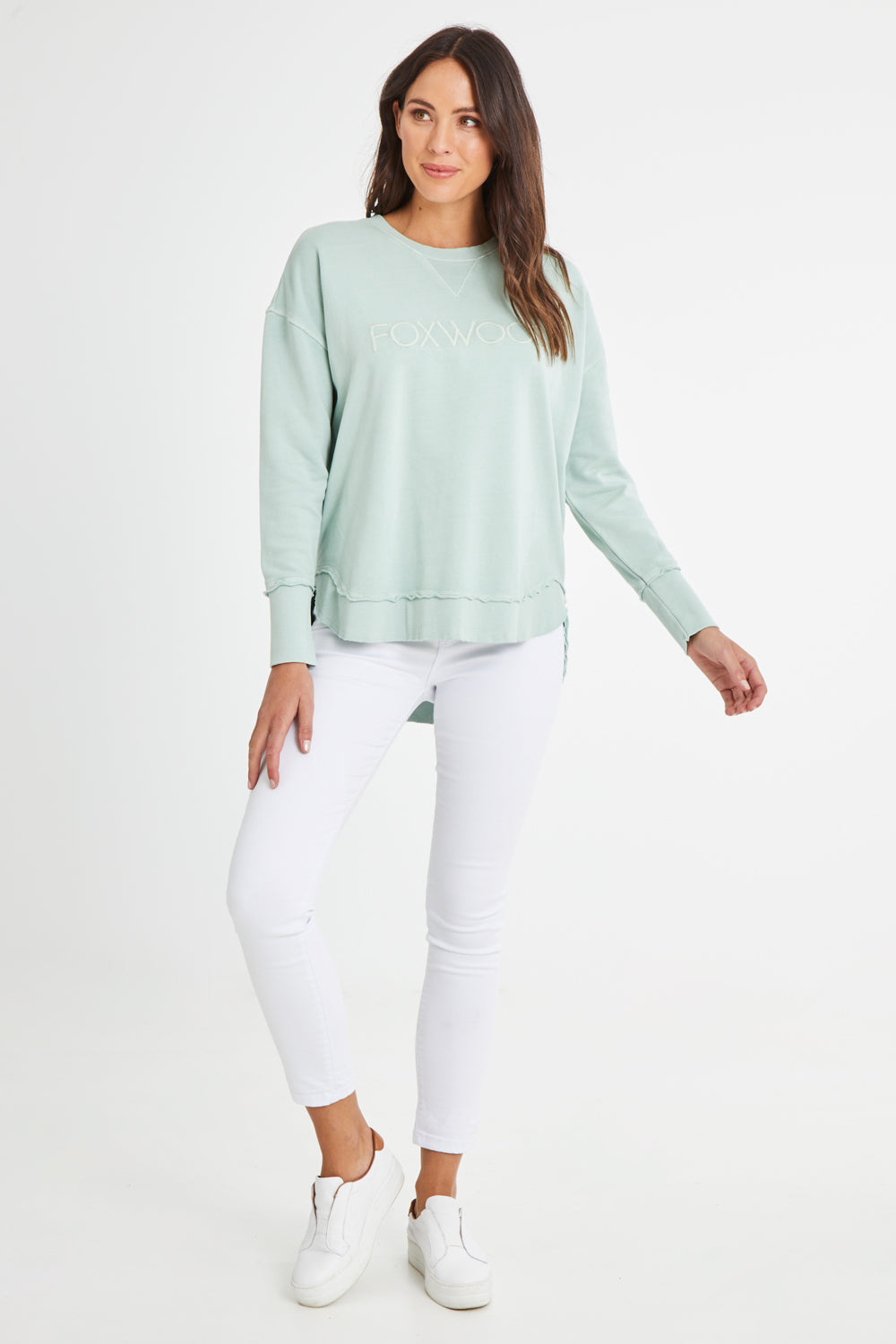 Model Madeline wearing size 10 of the Elements Simplified Cotton Crew in colour Seafoam (Green), from the front, showing the whole outfit