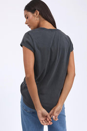 A model wearing the Elements Signature Cotton Tee in colour Black (Black), from the back