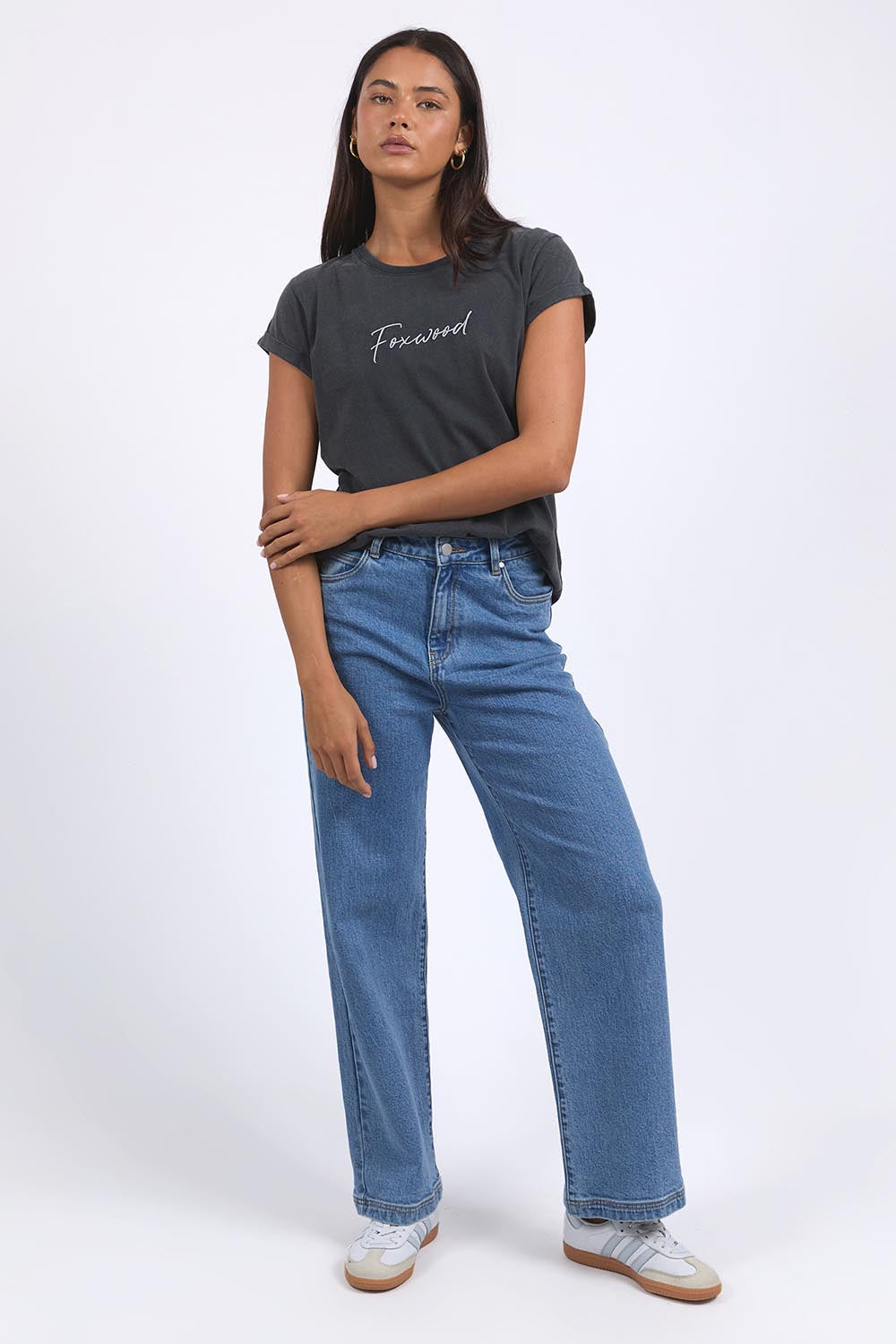 A model wearing the Elements Signature Cotton Tee in colour Black (Black), from the front, showing the whole outfit