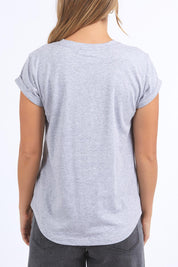 A model wearing the Elements Signature Cotton Tee in colour Greymarle (Grey), from the back