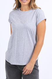 A model wearing the Elements Signature Cotton Tee in colour Greymarle (Grey), from the front, cropped image