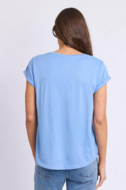 Model Genericm wearing size sample of the Elements Manly Cotton Tee - Cornflower in colour Cornflower, from the back