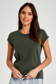 Model Madeline wearing size 10 of the Elements Manly Cotton Tee in colour Khaki (Green), from the front, cropped image