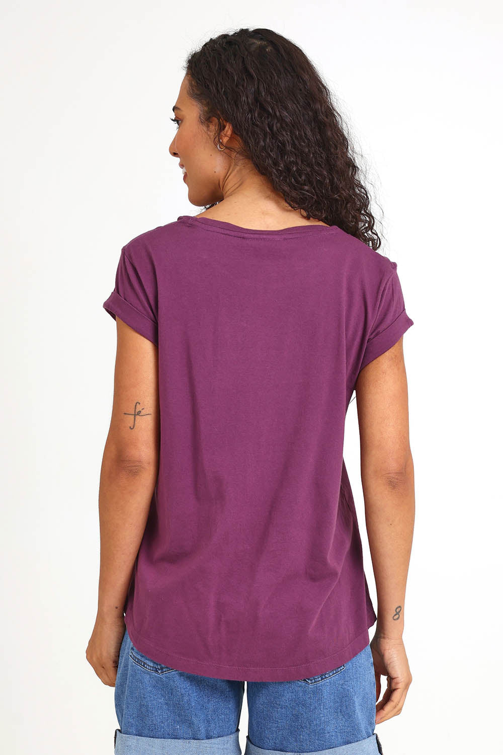 Model Pamelar wearing size 10 of the Elements Manly Cotton Tee – Plum in colour Plum, from the back