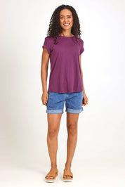 Model Pamelar wearing size 10 of the Elements Manly Cotton Tee – Plum in colour Plum, from the front