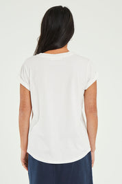 Model Katie wearing size 10 of the Elements Manly Cotton Tee in colour White (White), from the back