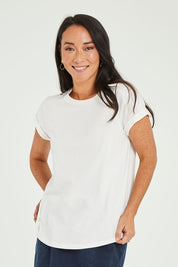 Model Katie wearing size 10 of the Elements Manly Cotton Tee in colour White (White), from the front, cropped image