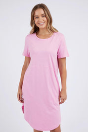 A model wearing the Elements Bay Cotton Dress in colour Lavender (Purple), from the front, cropped image