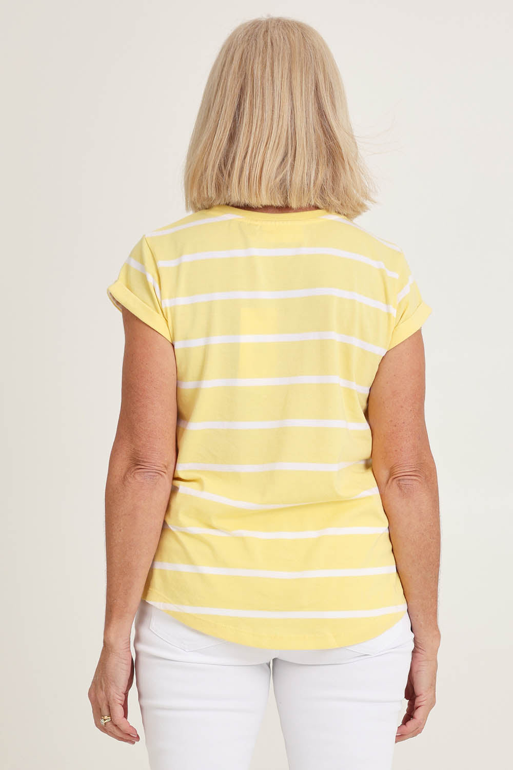 Model Sandy wearing size 10 of the Elements Manly Stripe Cotton Tee in colour Sunshwhite, from the back
