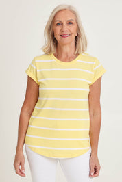 Model Sandy wearing size 10 of the Elements Manly Stripe Cotton Tee in colour Sunshwhite, from the front, cropped image