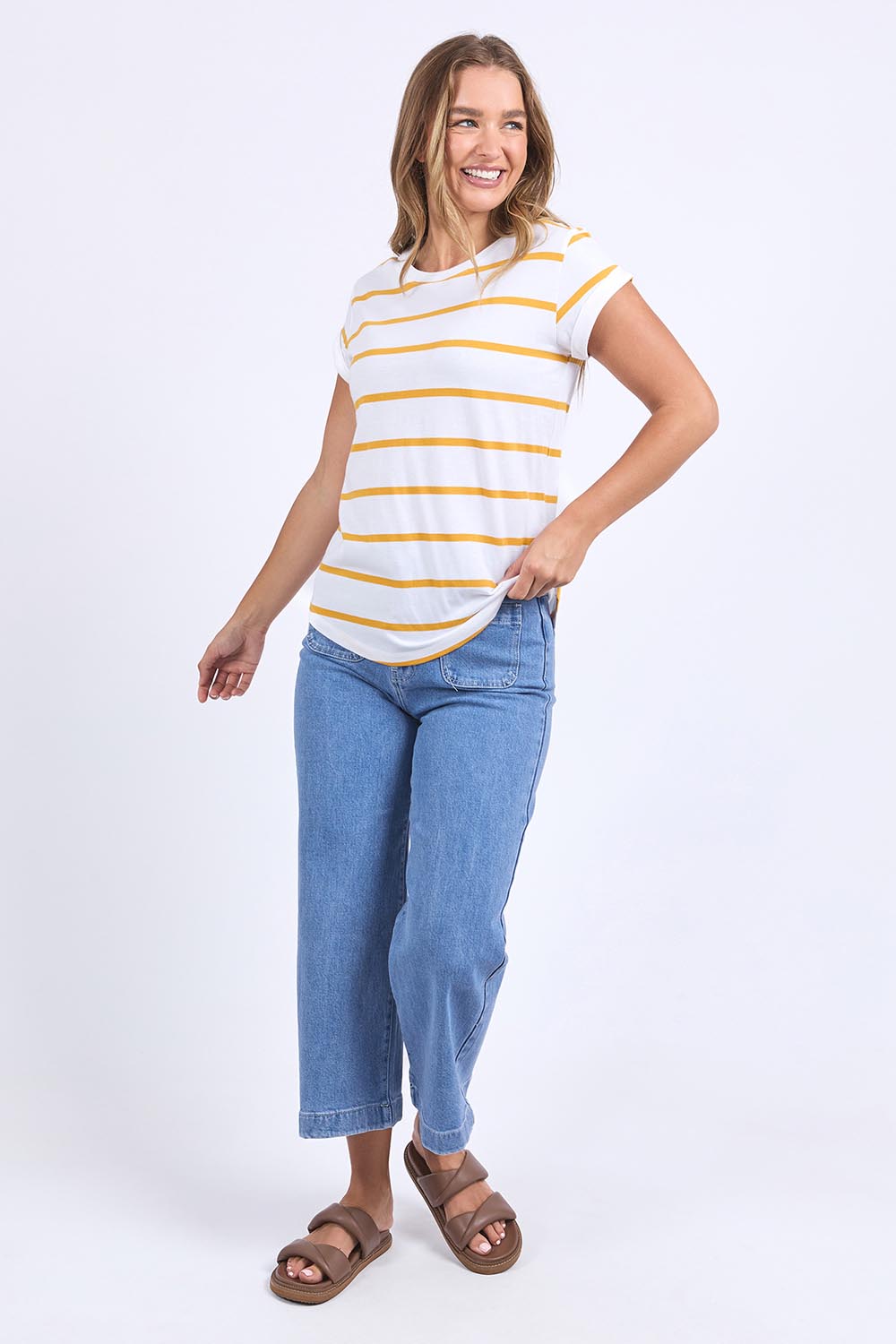 A model wearing the Elements Manly Stripe Cotton Tee in colour Whiteyello, from the front, showing the whole outfit