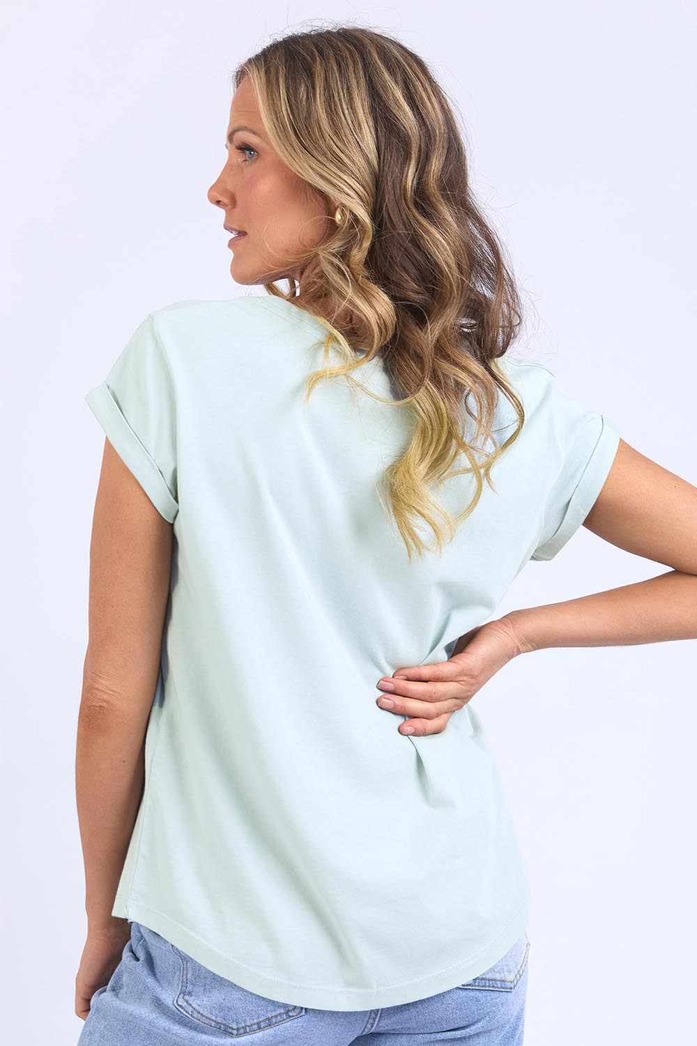 Model Genericm wearing size sample of the Elements Manly Cotton Vee Tee – Coolblue in colour Coolblue, from an angle