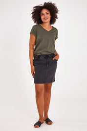 Model Olivia wearing size 10 of the Elements Manly Cotton Vee Tee in colour Khaki (Green), from the front, showing the whole outfit