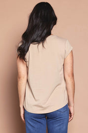 Model Katie wearing size 8 of the Elements Manly Cotton Vee Tee in colour Oat, from the back