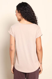 Model Pamelar wearing size 10 of the Elements Manly Cotton Vee Tee - Oat in colour Oat, from the back