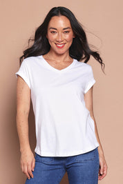 Model Katie wearing size 8 of the Elements Manly Cotton Vee Tee in colour White (White), from the front, cropped image
