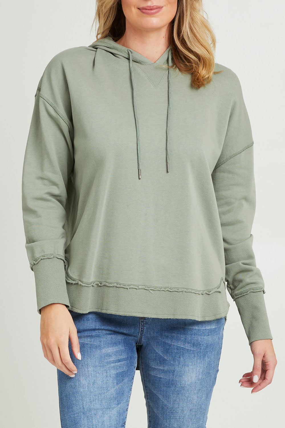 Model Grace wearing size 10 of the Elements Sigrid Hoody in colour Sagegreen (Green), from the front, cropped image