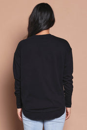 Model Katie wearing size 8 of the Elements Farrah Cotton Long Sleeve in colour Black (Black), from the back