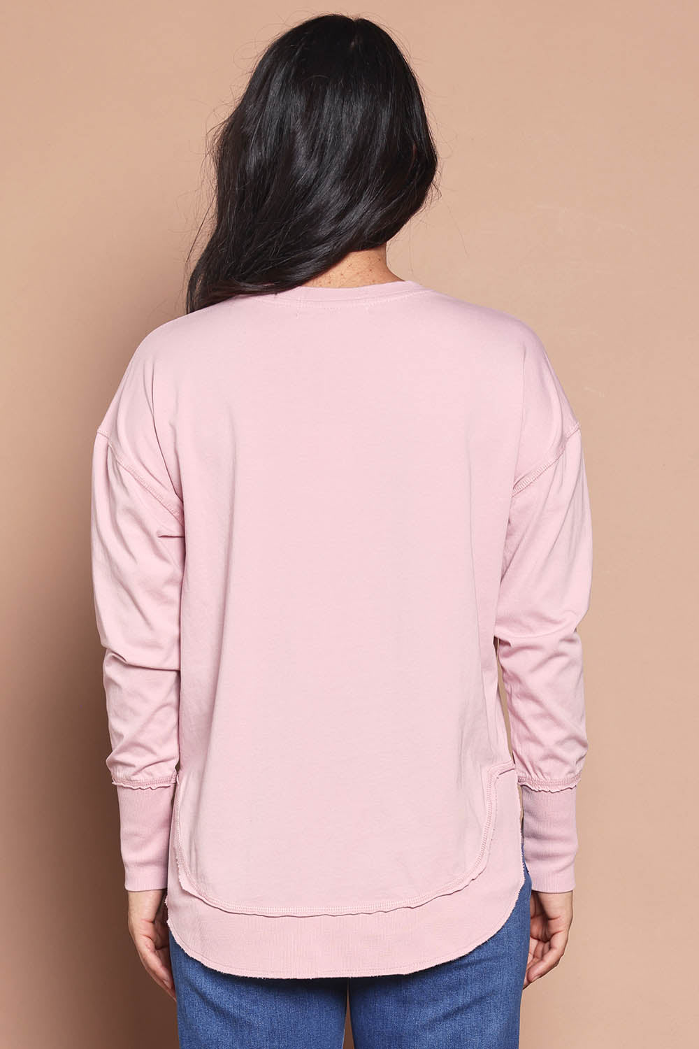 Model Katie wearing size 8 of the Elements Farrah Cotton Long Sleeve in colour Blossompin (White), from the back