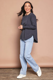 Model Katie wearing size 8 of the Elements Farrah Cotton Long Sleeve in colour Charcoal (Grey), from the front, showing the whole outfit