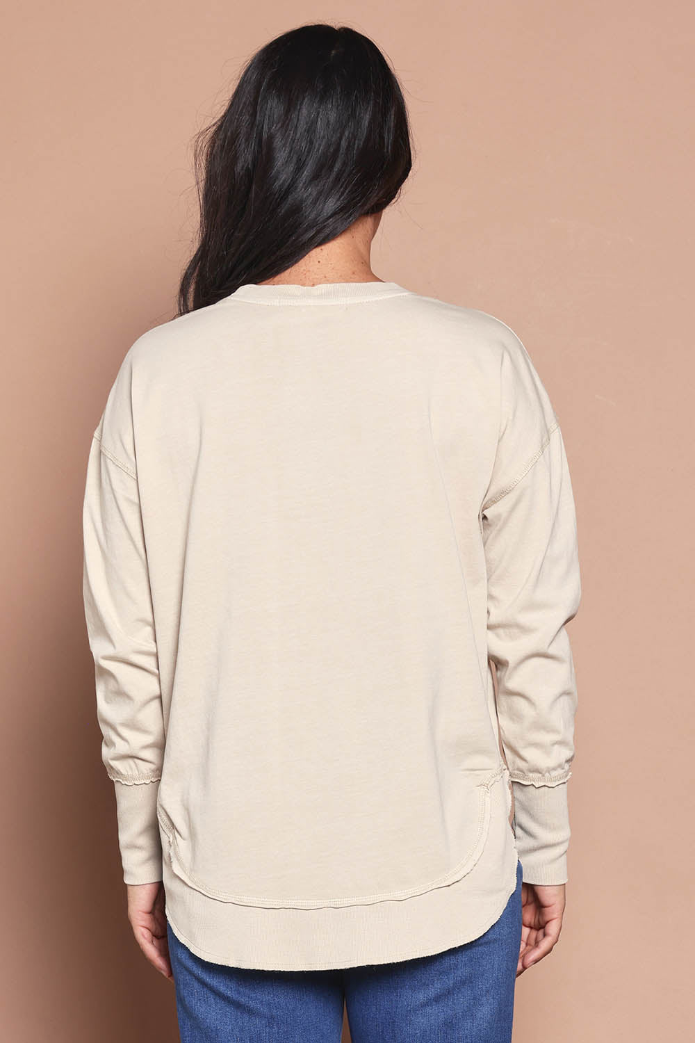 Model Katie wearing size 8 of the Elements Farrah Cotton Long Sleeve in colour Oat, from the back