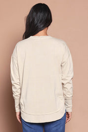 Model Katie wearing size 8 of the Elements Farrah Cotton Long Sleeve in colour Oat, from the back