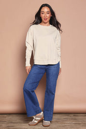Model Katie wearing size 8 of the Elements Farrah Cotton Long Sleeve in colour Oat, from the front, showing the whole outfit