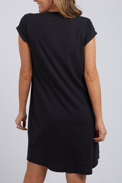 A model wearing the Elements Manly Vee Tee Dress in colour Black (Black), from the back