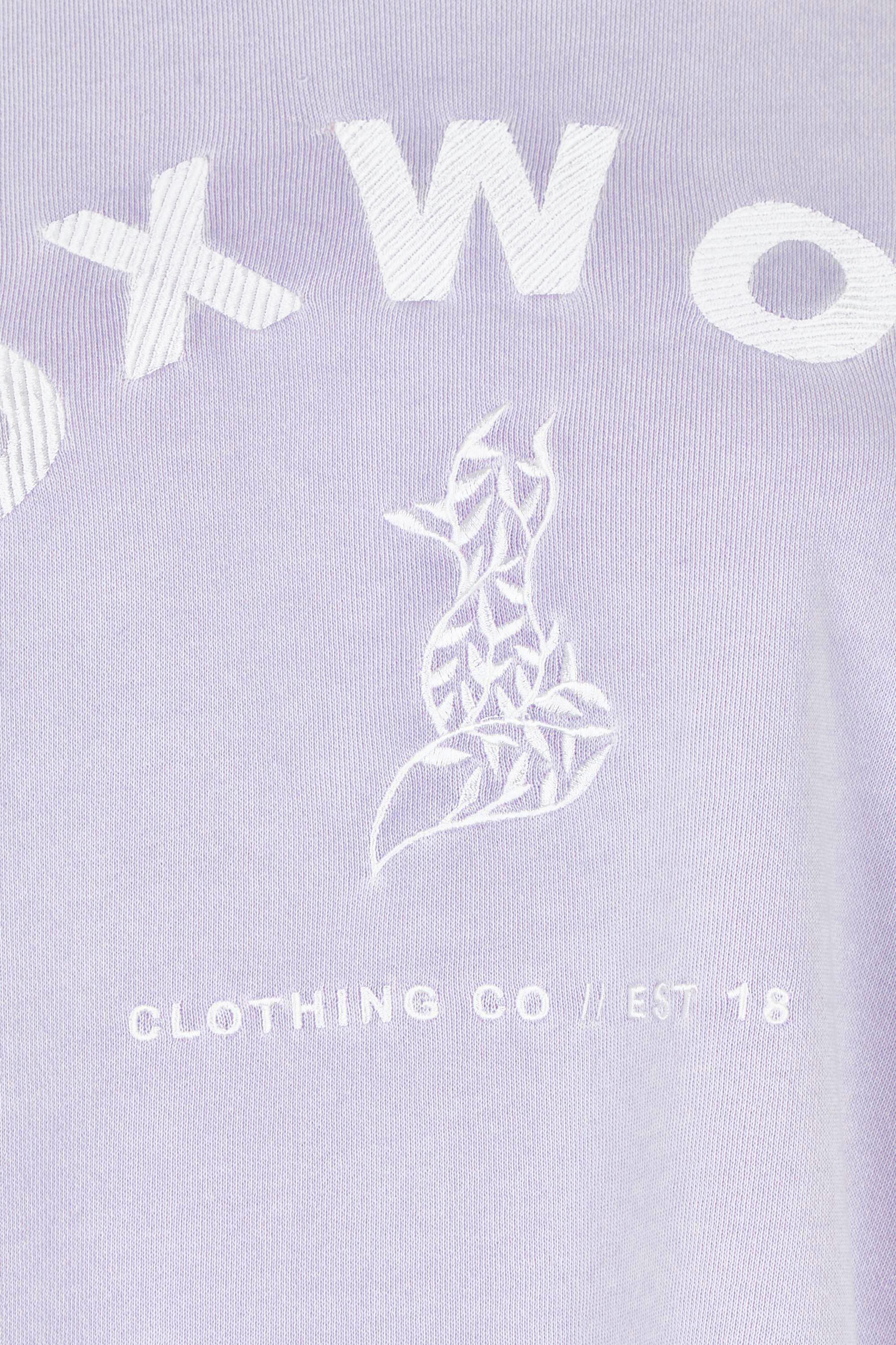 Product shot of the Effortless Cotton Crew in colour Pastelorch (Purple), detail