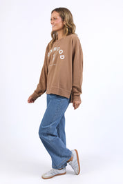 A model wearing the Effortless Cotton Crew in colour Toastcocon, from the front, showing the whole outfit