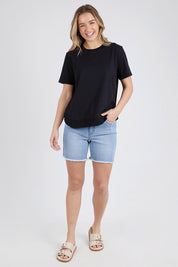 A model wearing the Elements Farrah Short Sleeve Cotton Tee in colour Black (Black), from the front, showing the whole outfit