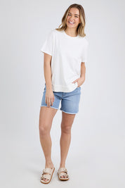 A model wearing the Elements Farrah Short Sleeve Cotton Tee in colour White (White), from the front, showing the whole outfit
