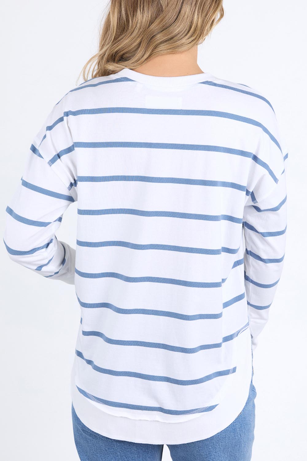 A model wearing the Elements Farrah Stripe Cotton Long Sleeve in colour Whicoronet (White), from the back