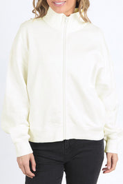 A model wearing the Elements Ember Zip Thru in colour White (White), from the front, cropped image