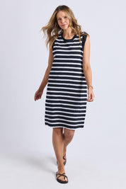 A model wearing the Elements Reform Stripe Cotton Dress in colour Blackwhite (Black), from the front, showing the whole outfit