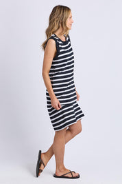 A model wearing the Elements Reform Stripe Cotton Dress in colour Blackwhite (Black), from the front, showing the whole outfit