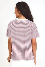 Model Pamelar wearing size 10 of the Elements Hutch Stripe Cotton Tee – Russetbrow in colour Russetbrow, from the back