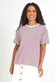 Model Pamelar wearing size 10 of the Elements Hutch Stripe Cotton Tee – Russetbrow in colour Russetbrow, in a cropped view