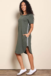 Model Pamelar wearing size 10 of the Elements Bay Tape Cotton Tee Dress - Khaki in colour Khaki, from the front