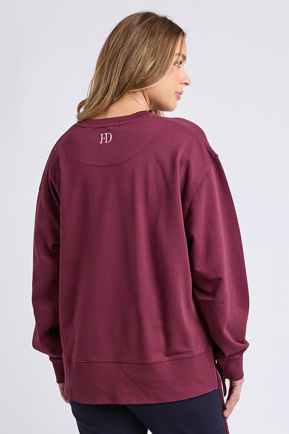 A model wearing the Elements Effortless Contrast Cotton Crew in colour Windorwine (Purple), from the back