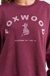 A model wearing the Elements Effortless Contrast Cotton Crew in colour Windorwine (Purple), from the front, cropped image