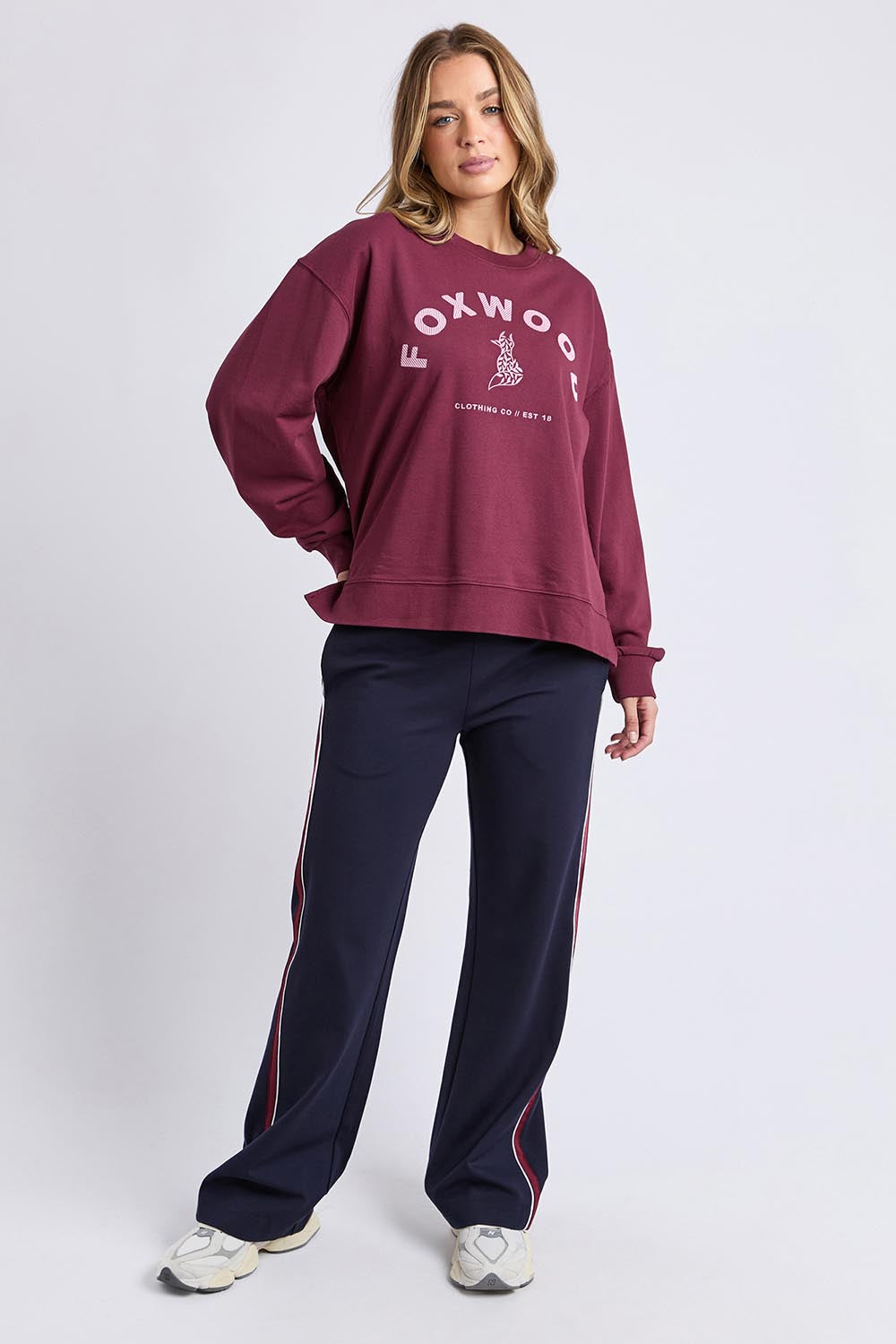 A model wearing the Elements Effortless Contrast Cotton Crew in colour Windorwine (Purple), from the front, showing the whole outfit