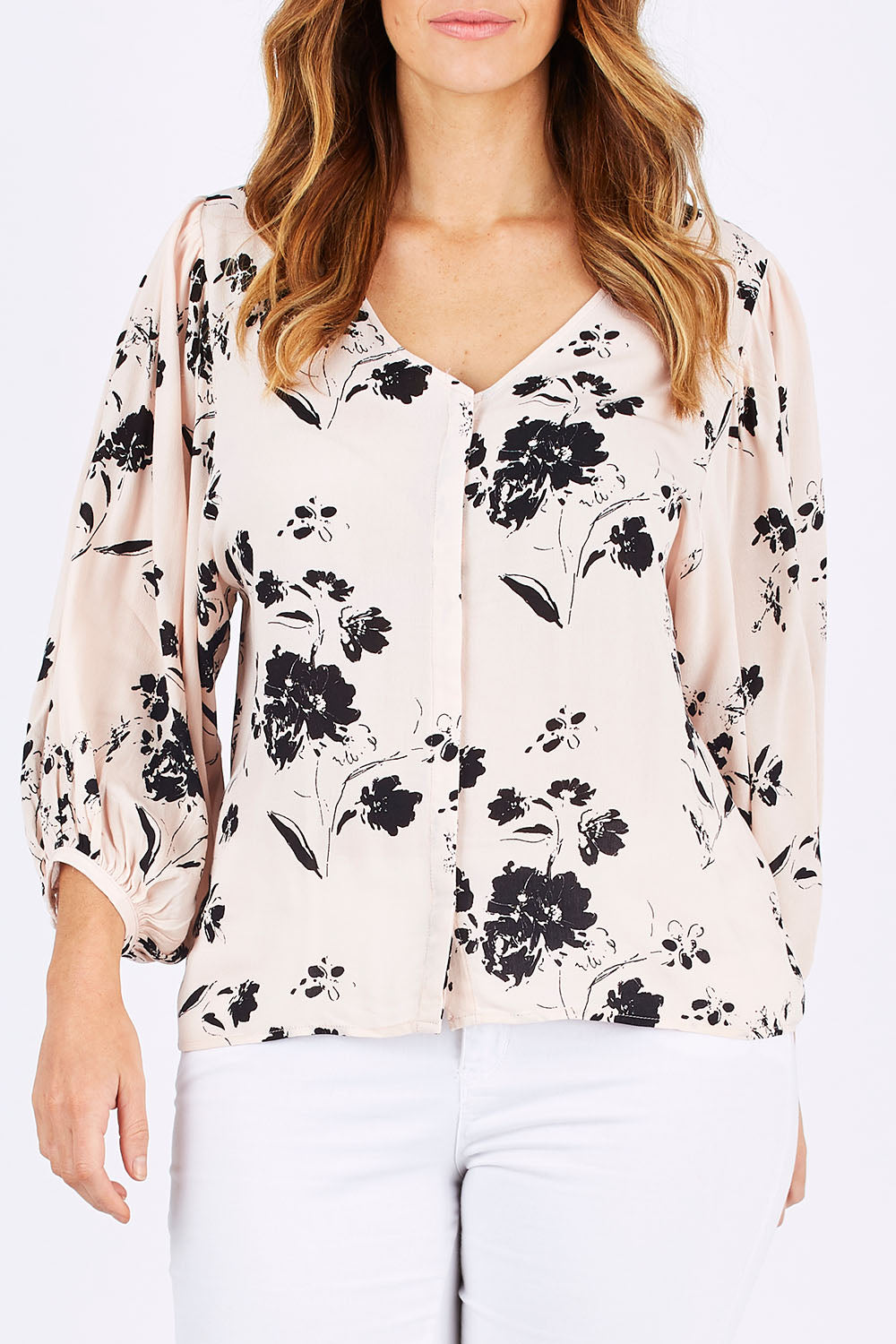 Model Laura wearing size 12 of the Dream Big Blouse in colour DreamBigBl (Pink), from the front, cropped image