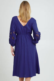 Model Grace wearing size 10 of the Our Love Linen Dress in colour Cobalt (Blue), from the back