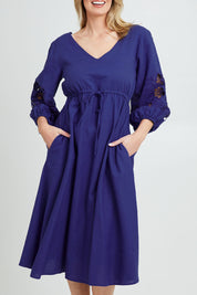 Model Grace wearing size 10 of the Our Love Linen Dress in colour Cobalt (Blue), from the front, cropped image