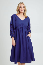 Model Grace wearing size 10 of the Our Love Linen Dress in colour Cobalt (Blue), from the front, cropped image