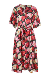 Product shot of the Lyrical Lyocell Midi Dress in colour Oscarflora (Pink), from the front