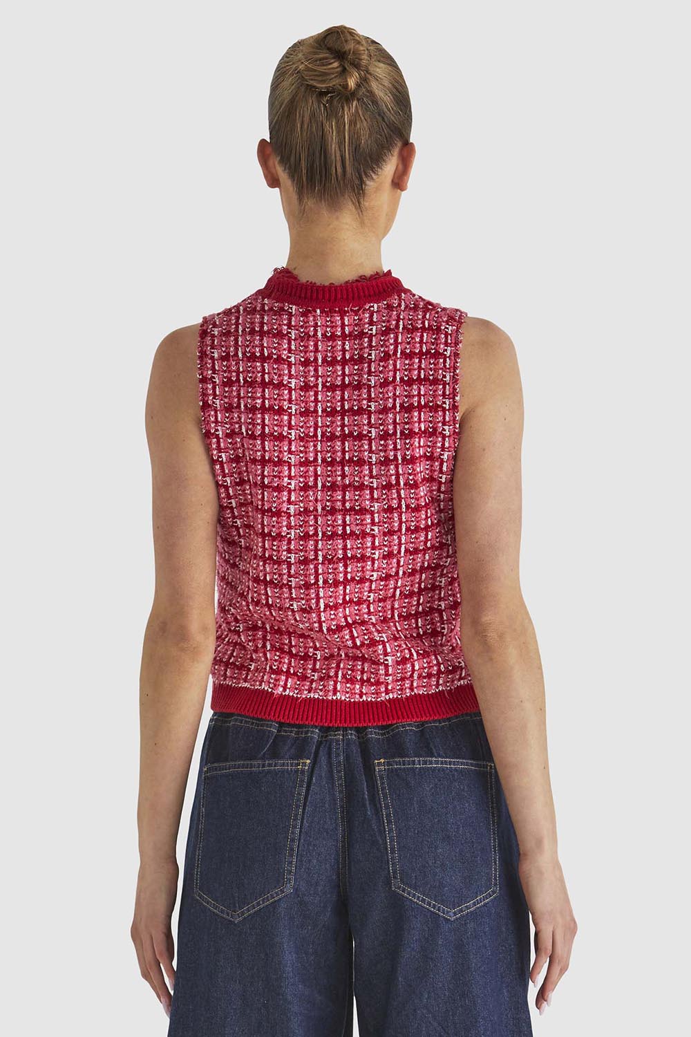 A model wearing the Kinetic Cotton Blend Knit Top in colour Pink (Pink), from the back