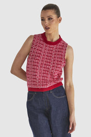 A model wearing the Kinetic Cotton Blend Knit Top in colour Pink (Pink), from the front, cropped image