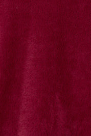 Product shot of the Electra Knit in colour Wine (Red), detail